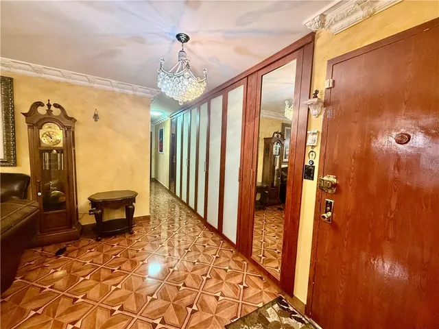 a very nice looking bedroom with a large window