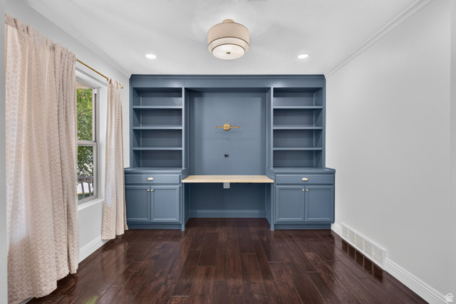 2223 North Pointe Meadow Loop Lehi, UT 84048 - Photo 5 of 56 Built-in desk and shelving unit featuring a painted blue finish and light wood-finish countertop