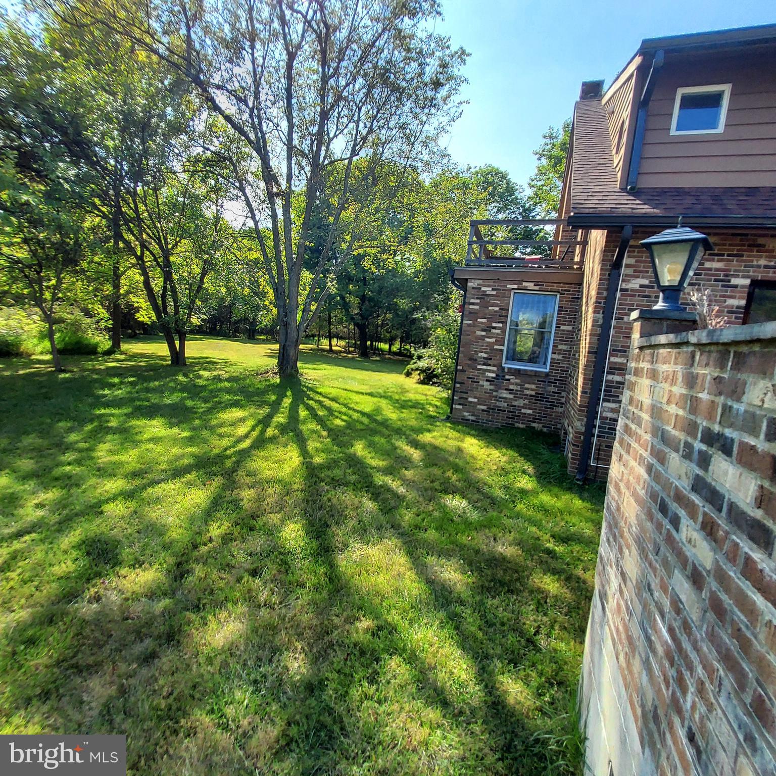 329 Pennington - Titusville Road Pennington, NJ 08534 - Photo 47 of 59 Side yard shows balcony from primary BR