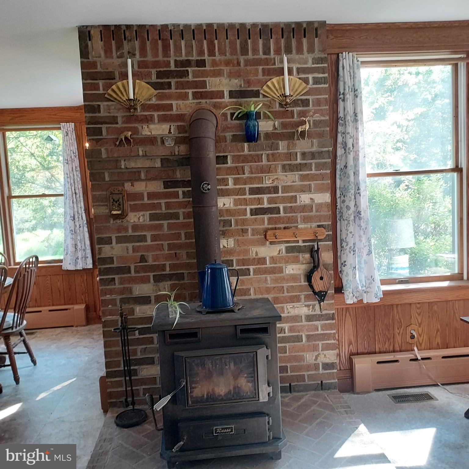 329 Pennington - Titusville Road Pennington, NJ 08534 - Photo 9 of 59 Wood stove in LR