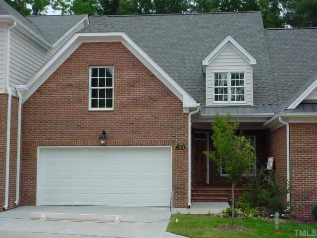 7372 Fontana Ridge Lane Raleigh, NC 27613 - Photo 1 of 1 a front view of a house with a yard