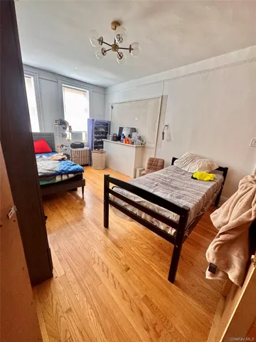 a kitchen with stainless steel appliances a stove a sink and a refrigerator