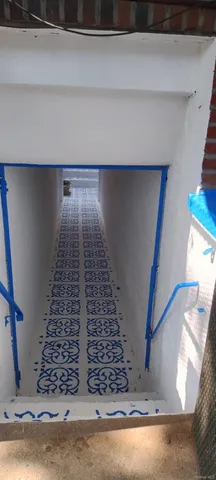 a bathroom with a granite countertop toilet sink and a shower