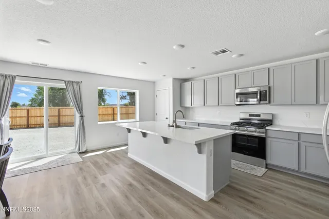 a view of storage and utility room with washer and dryer