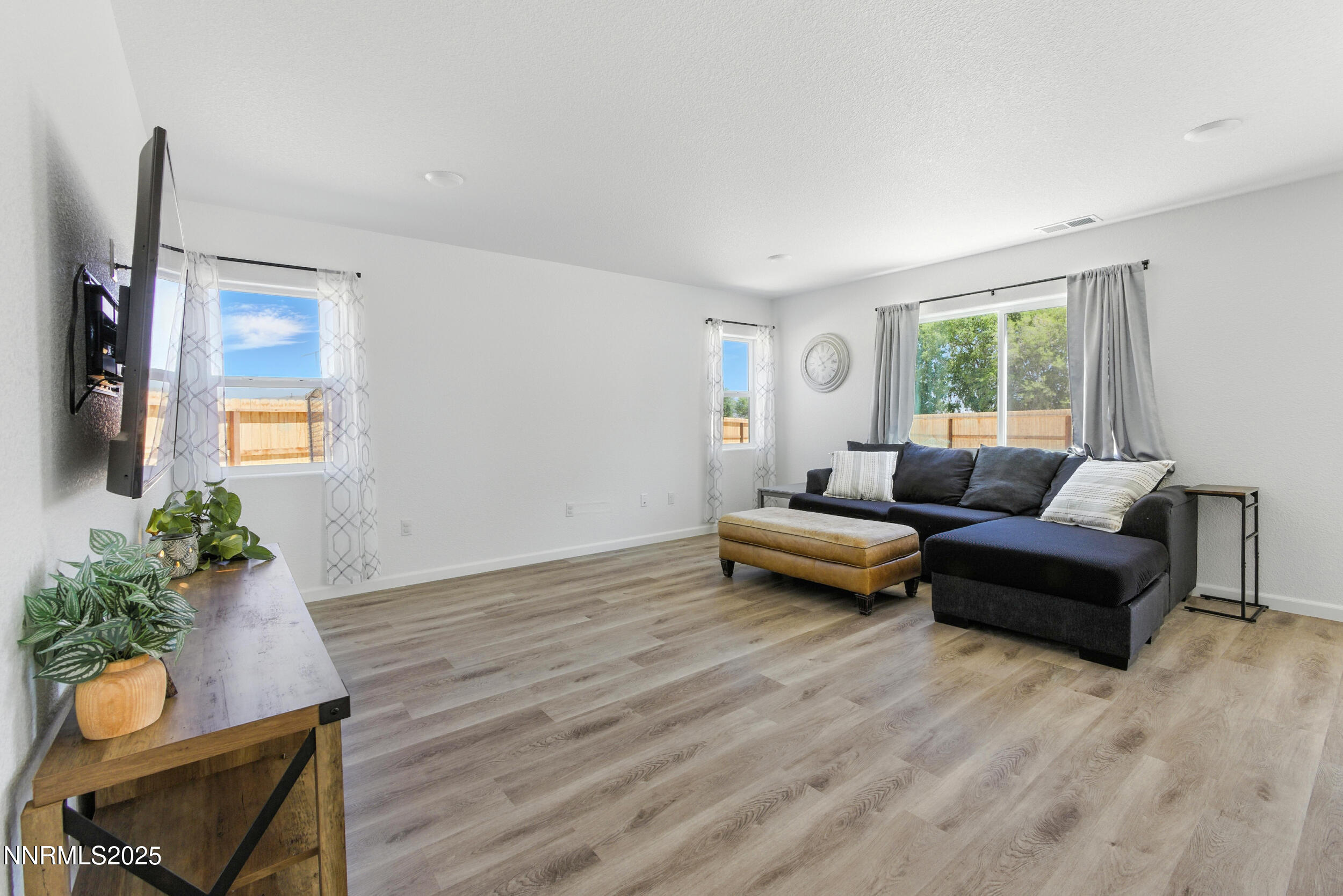 6778 Shell Court Fernley, NV 89408 - Photo 15 of 33 a living room with furniture and a large window