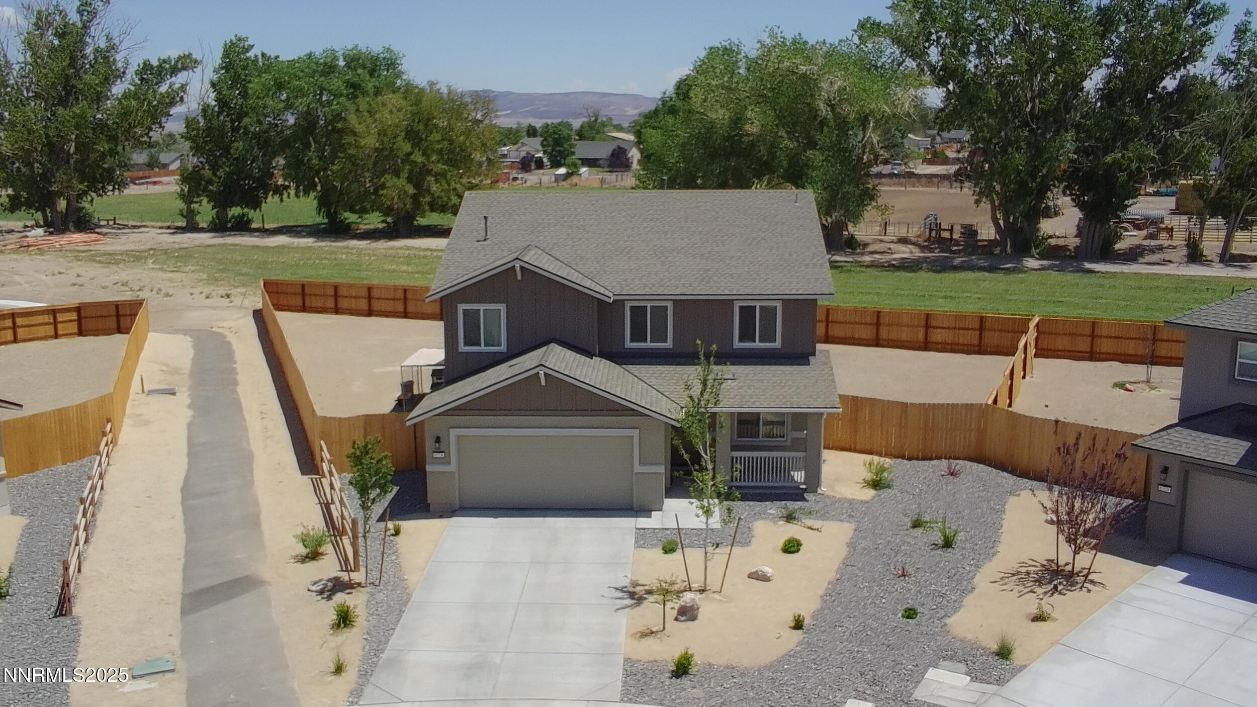 6778 Shell Court Fernley, NV 89408 - Photo 2 of 33 an aerial view of a house with garden