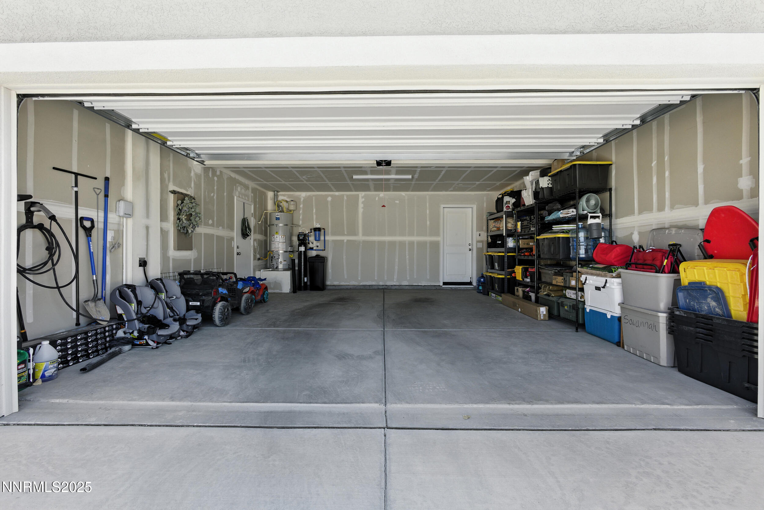 6778 Shell Court Fernley, NV 89408 - Photo 28 of 33 a view of a garage with rack and bicycle