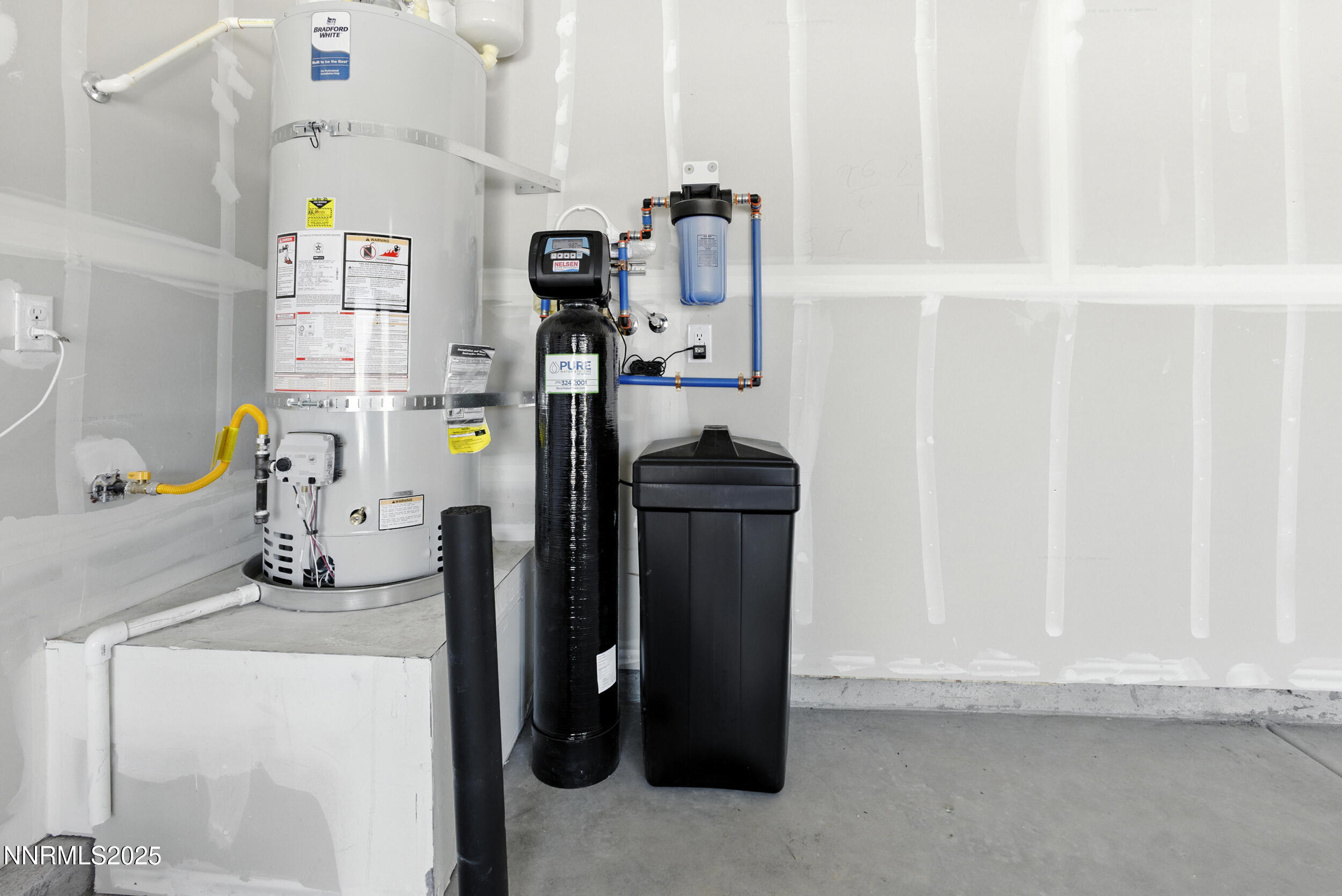 6778 Shell Court Fernley, NV 89408 - Photo 29 of 33 a view of storage and utility room with washer and dryer