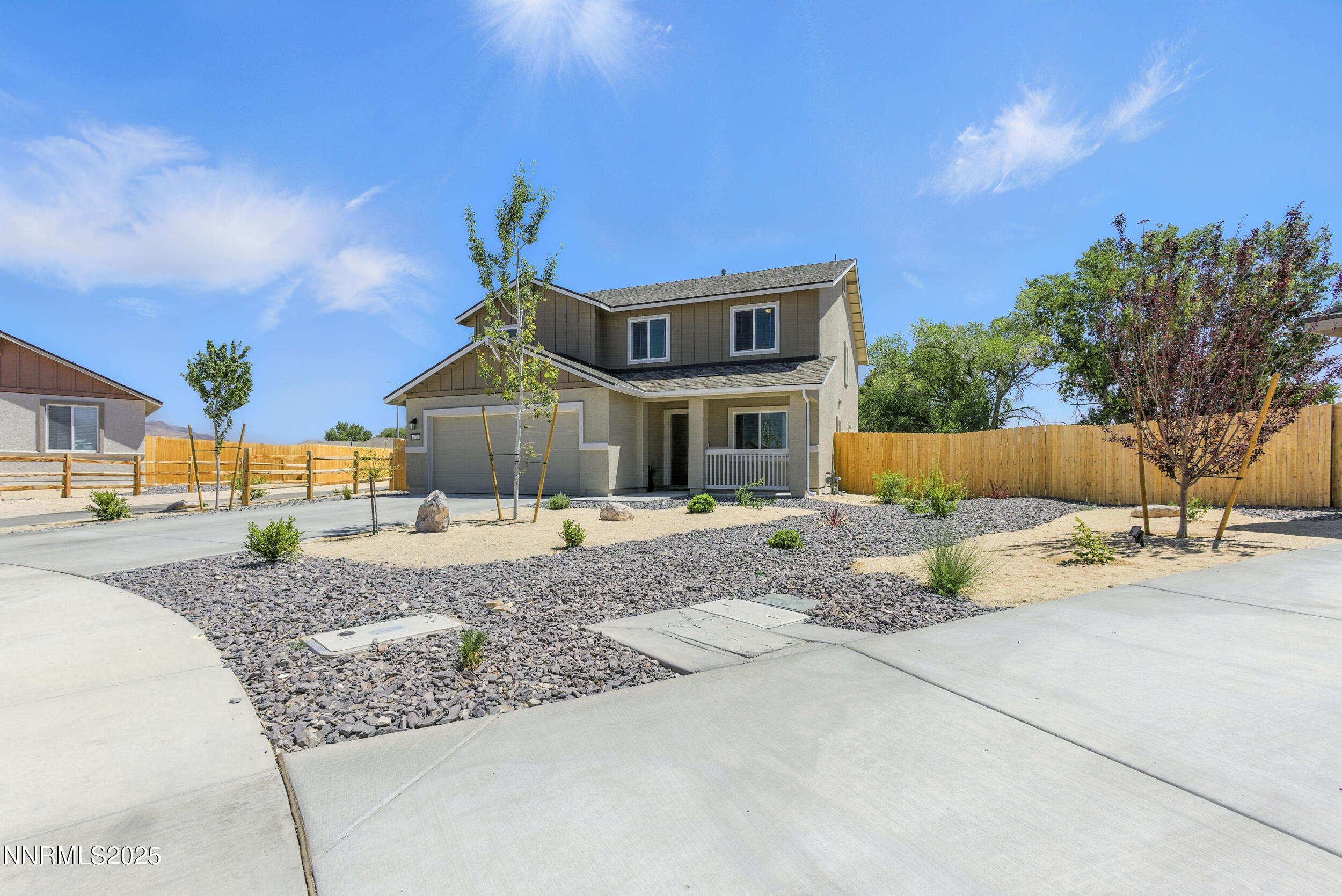 6778 Shell Court Fernley, NV 89408 - Photo 31 of 33 a front view of a house with a yard