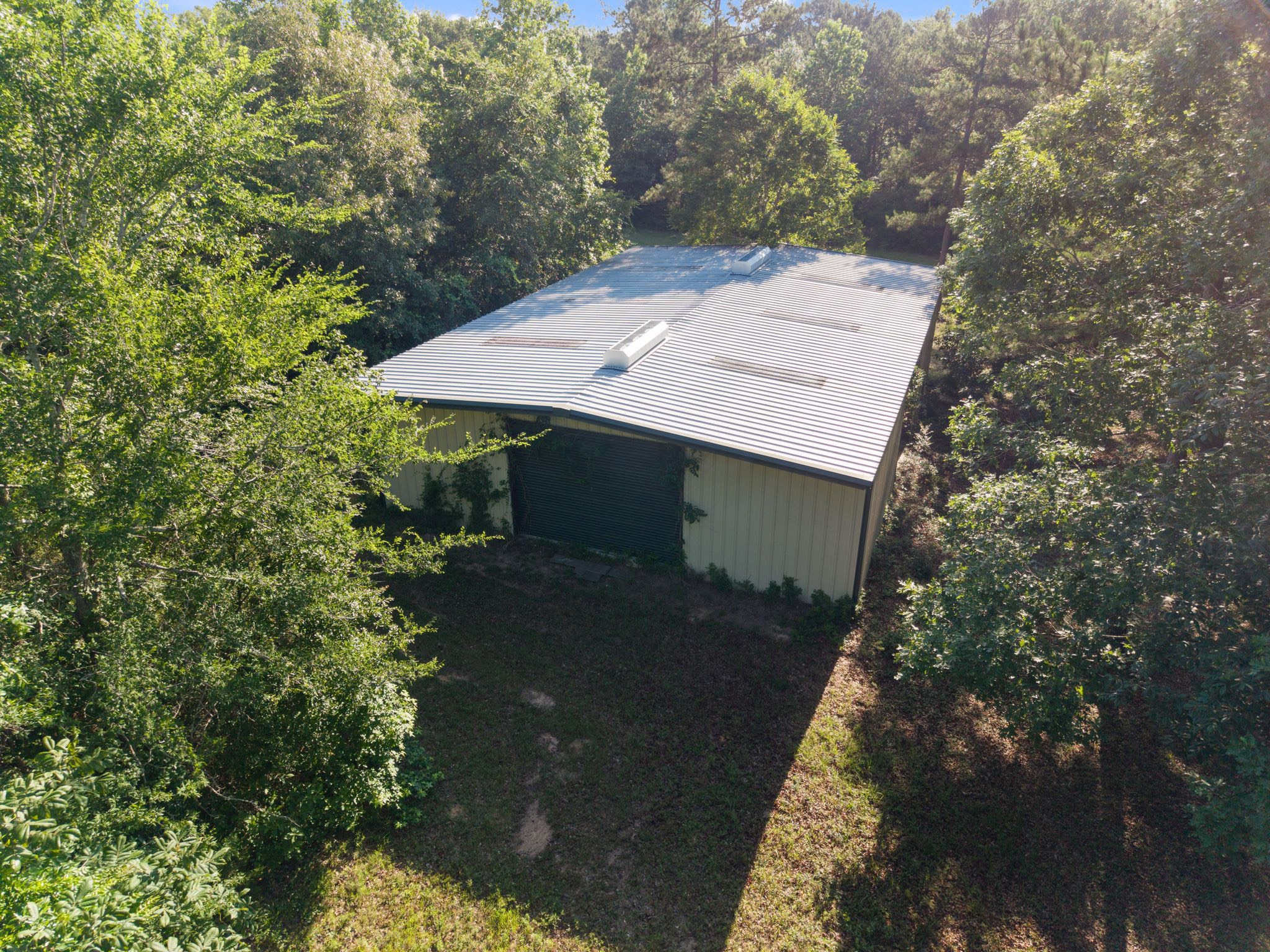 200 Spring Ridge Road Coldspring, TX 77331 - Photo 18 of 18 a view of a house with a yard
