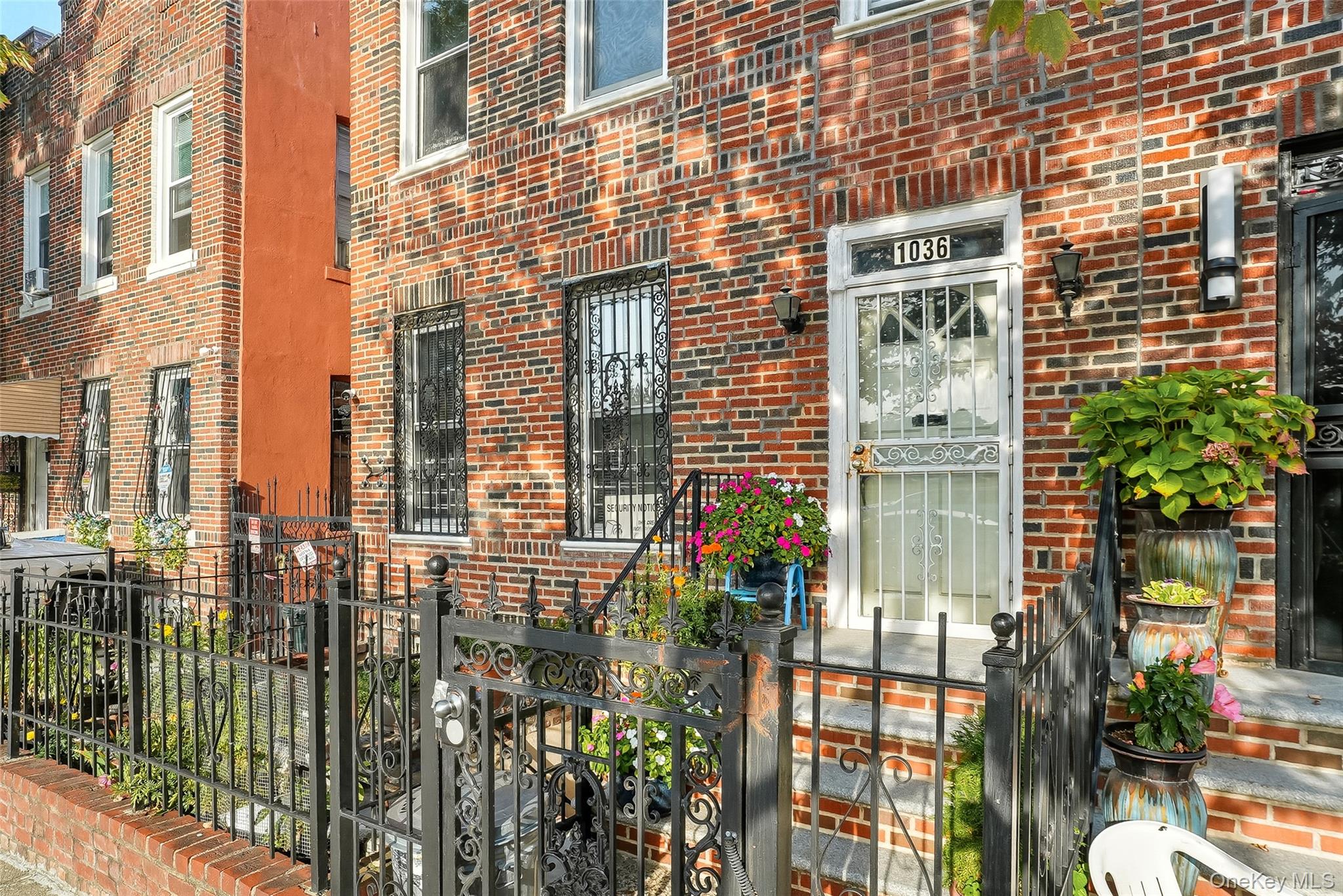 1036 Metcalf Avenue Bronx, NY 10472 - Photo 2 of 26 a view of a building with a potted plant