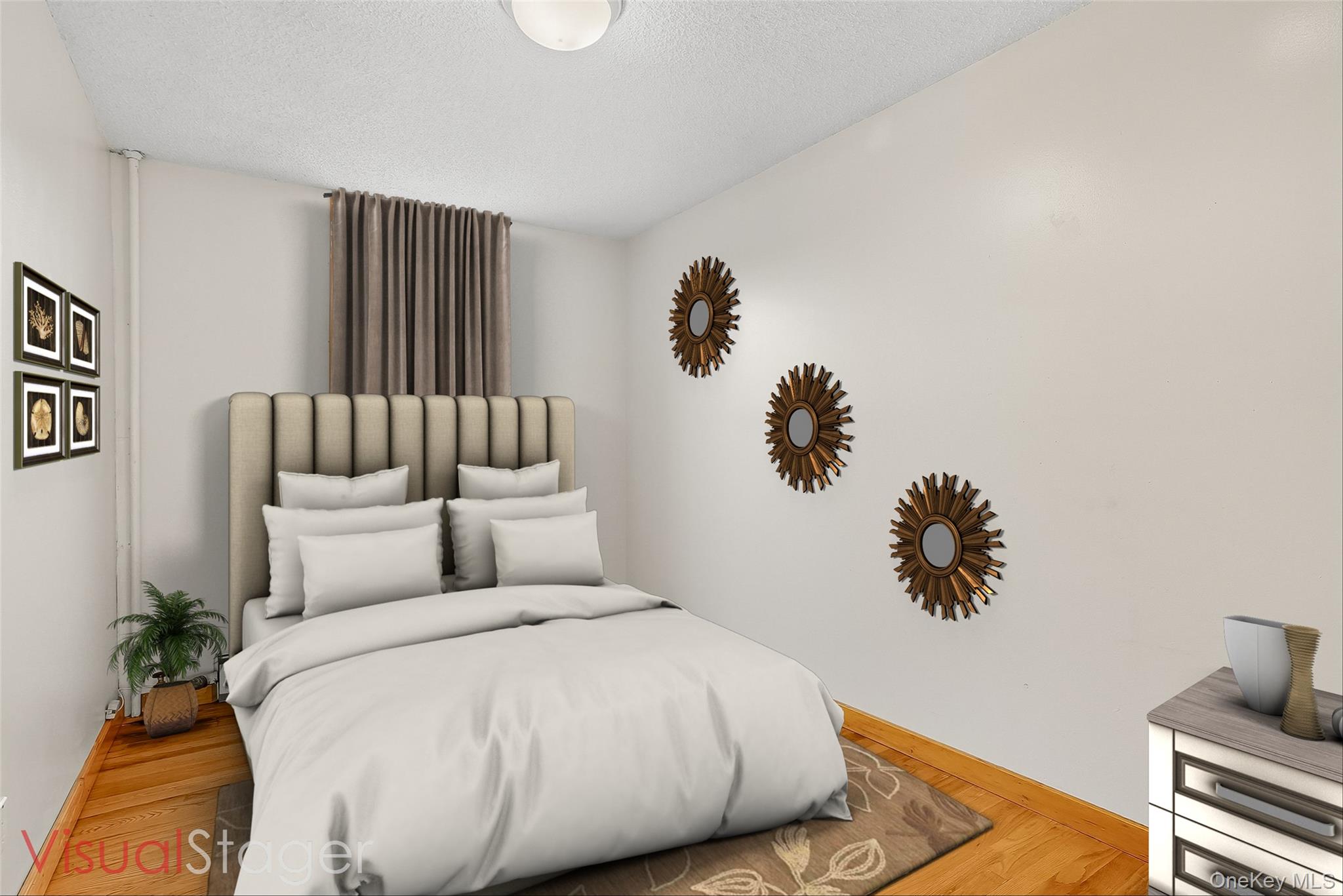 1036 Metcalf Avenue Bronx, NY 10472 - Photo 7 of 26 a bedroom with a large bed and a couch