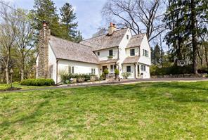 290 Hamilton Road Chappaqua, NY 10514 - Photo 1 of 1 a view of a white house with a large yard and large trees