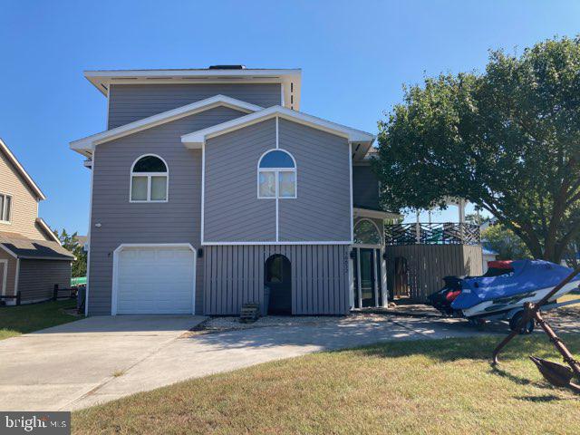 a front view of a house with patio
