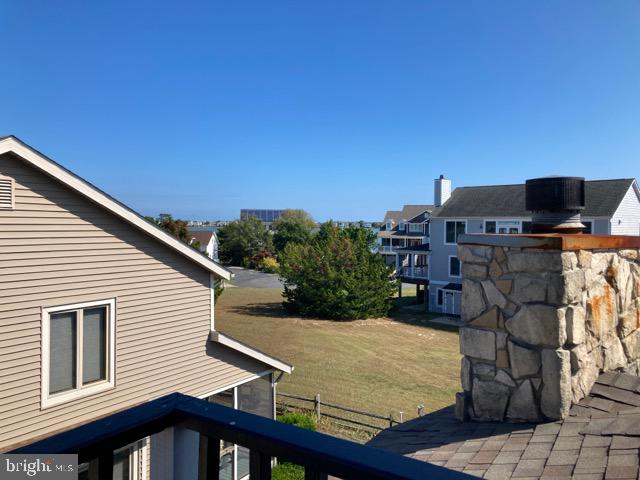 38852 Bayfront Drive Ocean View, DE 19970 - Photo 24 of 28 a view of a roof deck with couches and wooden floor