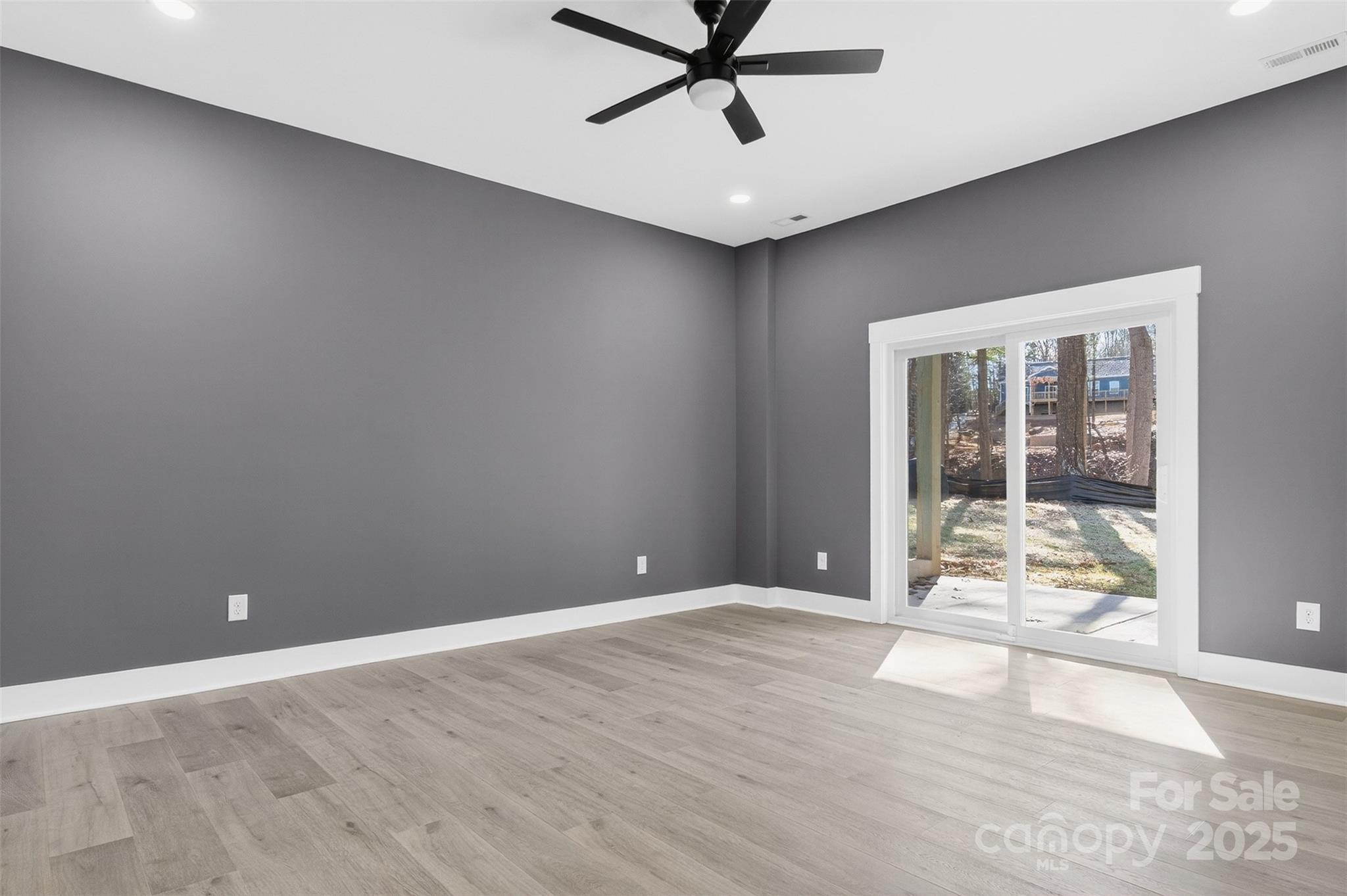 7663 Keistlers Store Road Sherrills Ford, NC 28673 - Photo 26 of 45 en empty room with window and ceiling fan