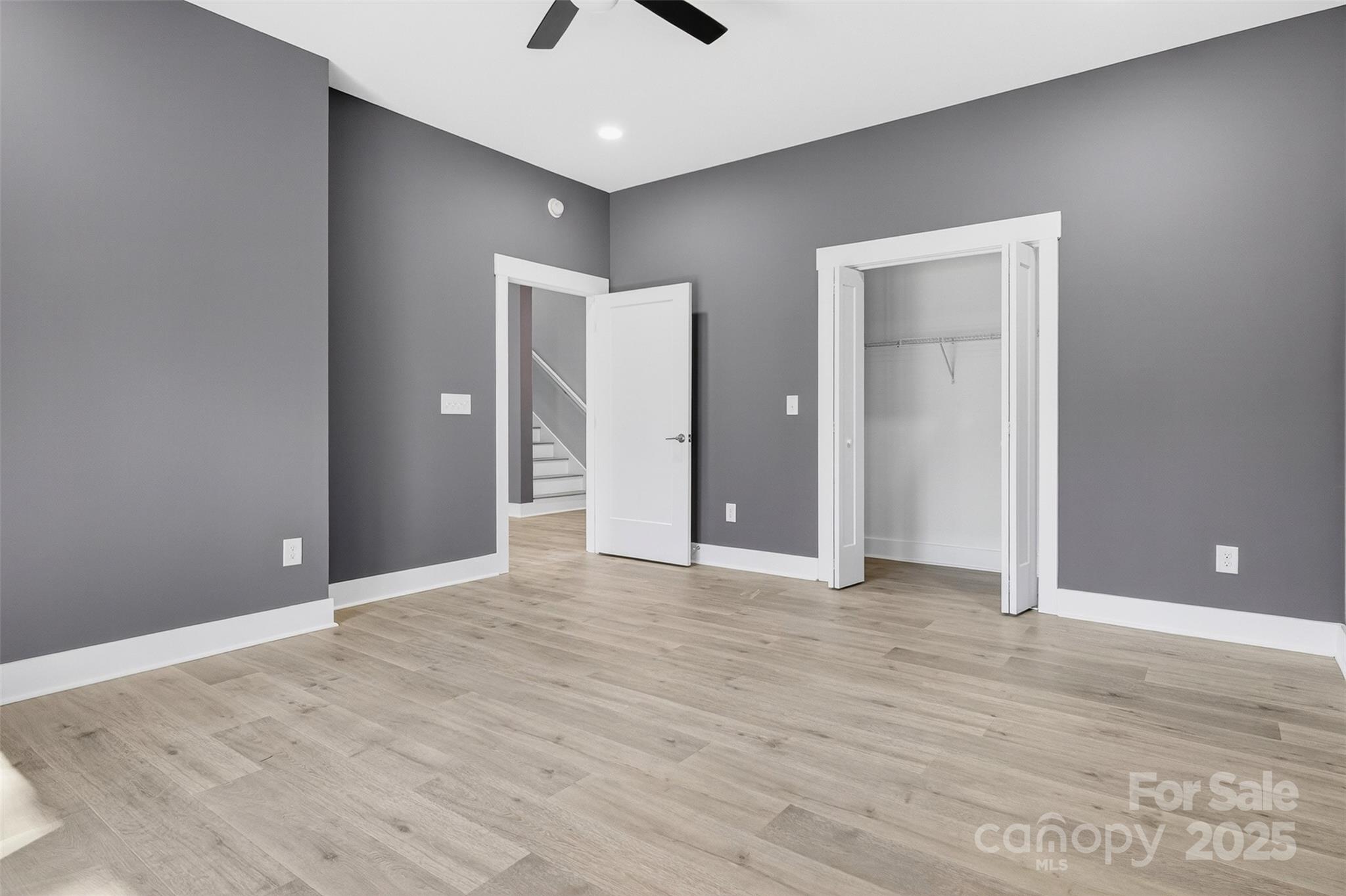 7663 Keistlers Store Road Sherrills Ford, NC 28673 - Photo 27 of 45 a view of an empty room with wooden floor