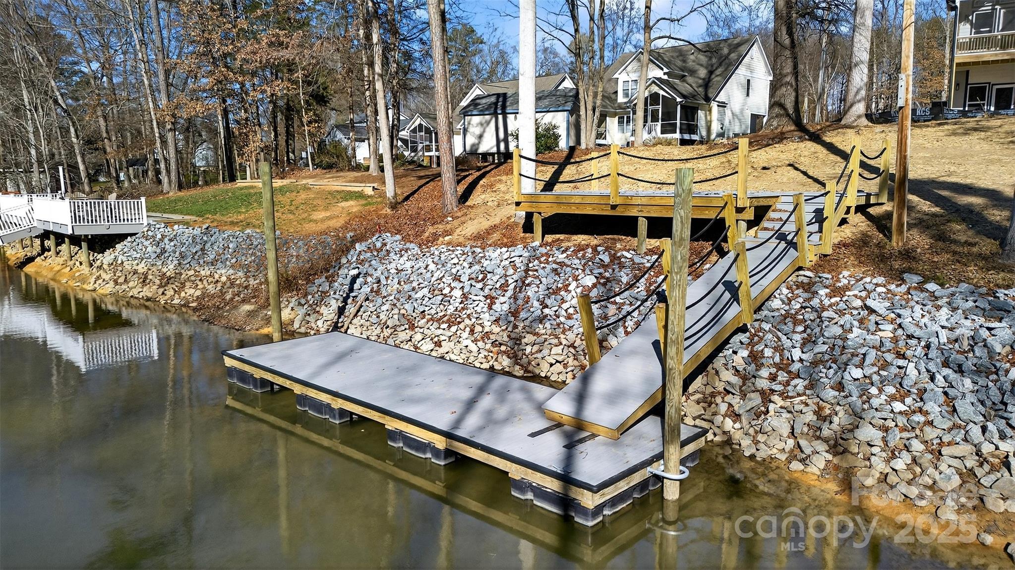 7663 Keistlers Store Road Sherrills Ford, NC 28673 - Photo 3 of 45 a aerial view of a house with swimming pool and sitting area