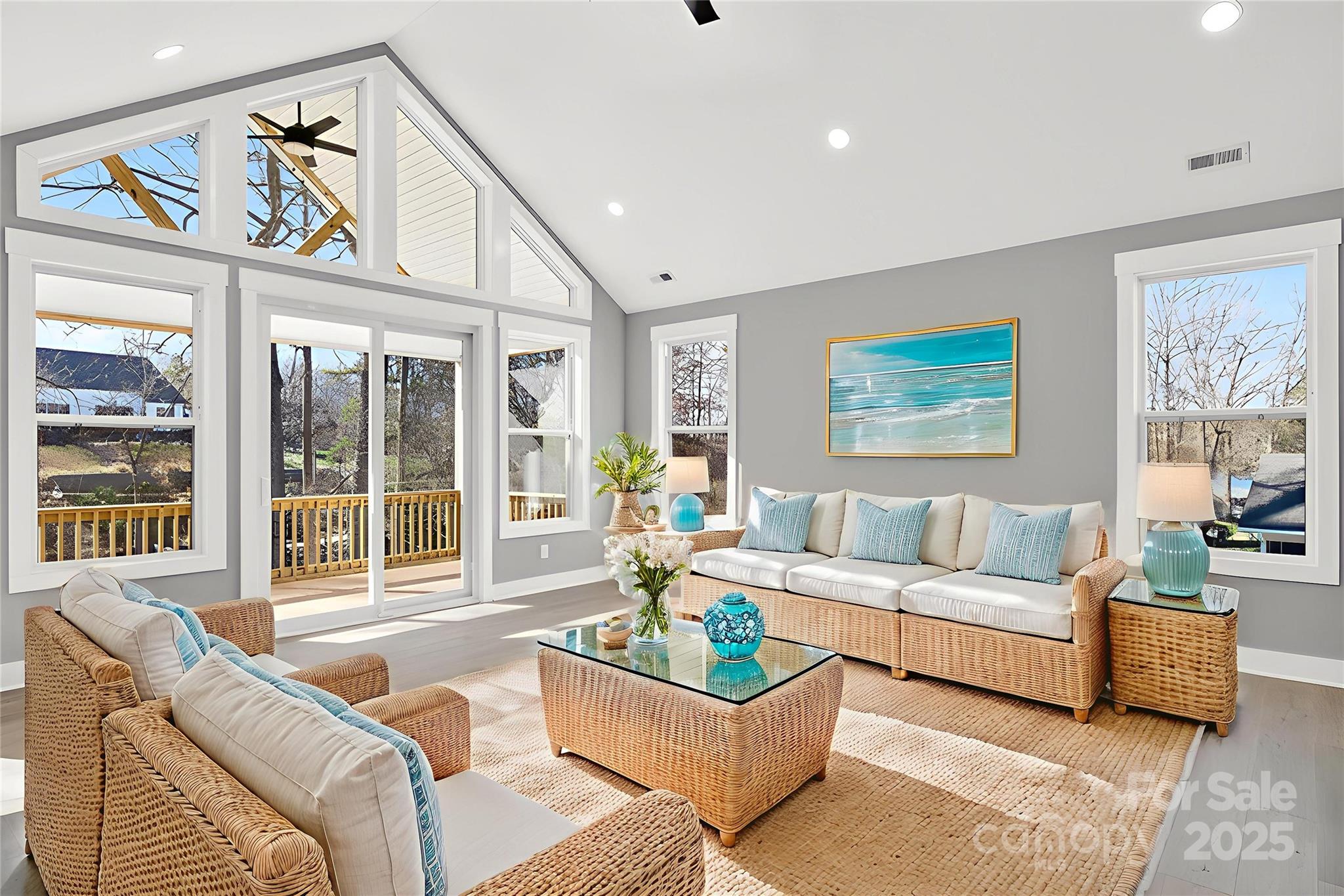 7663 Keistlers Store Road Sherrills Ford, NC 28673 - Photo 33 of 45 a living room with furniture ceiling fan and a rug