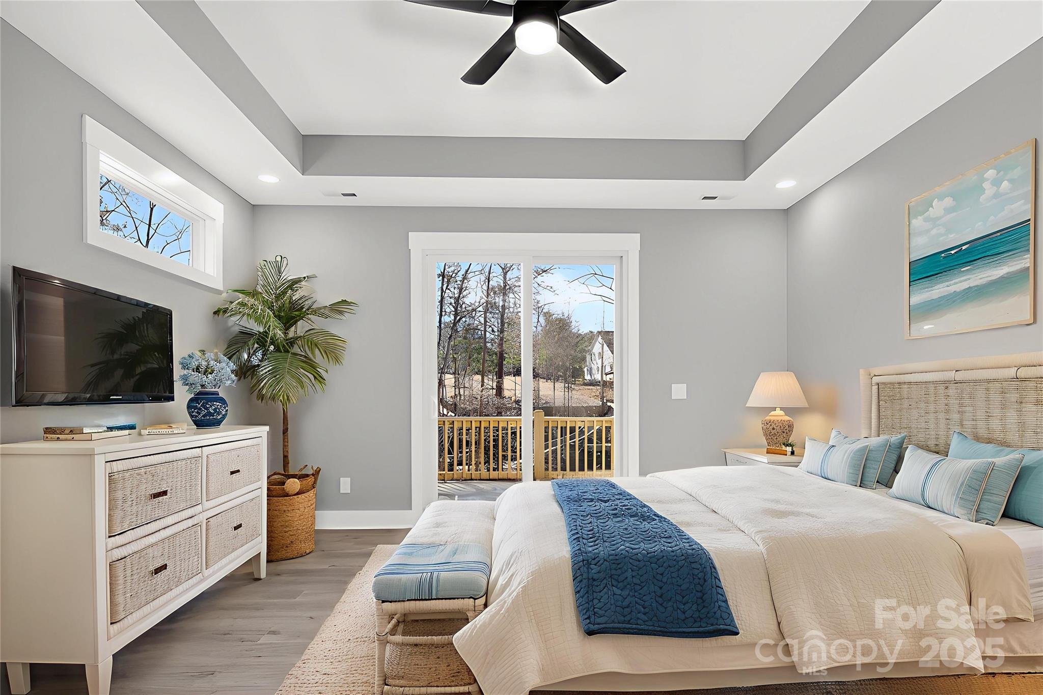 7663 Keistlers Store Road Sherrills Ford, NC 28673 - Photo 34 of 45 a bedroom with a bed and a flat screen tv