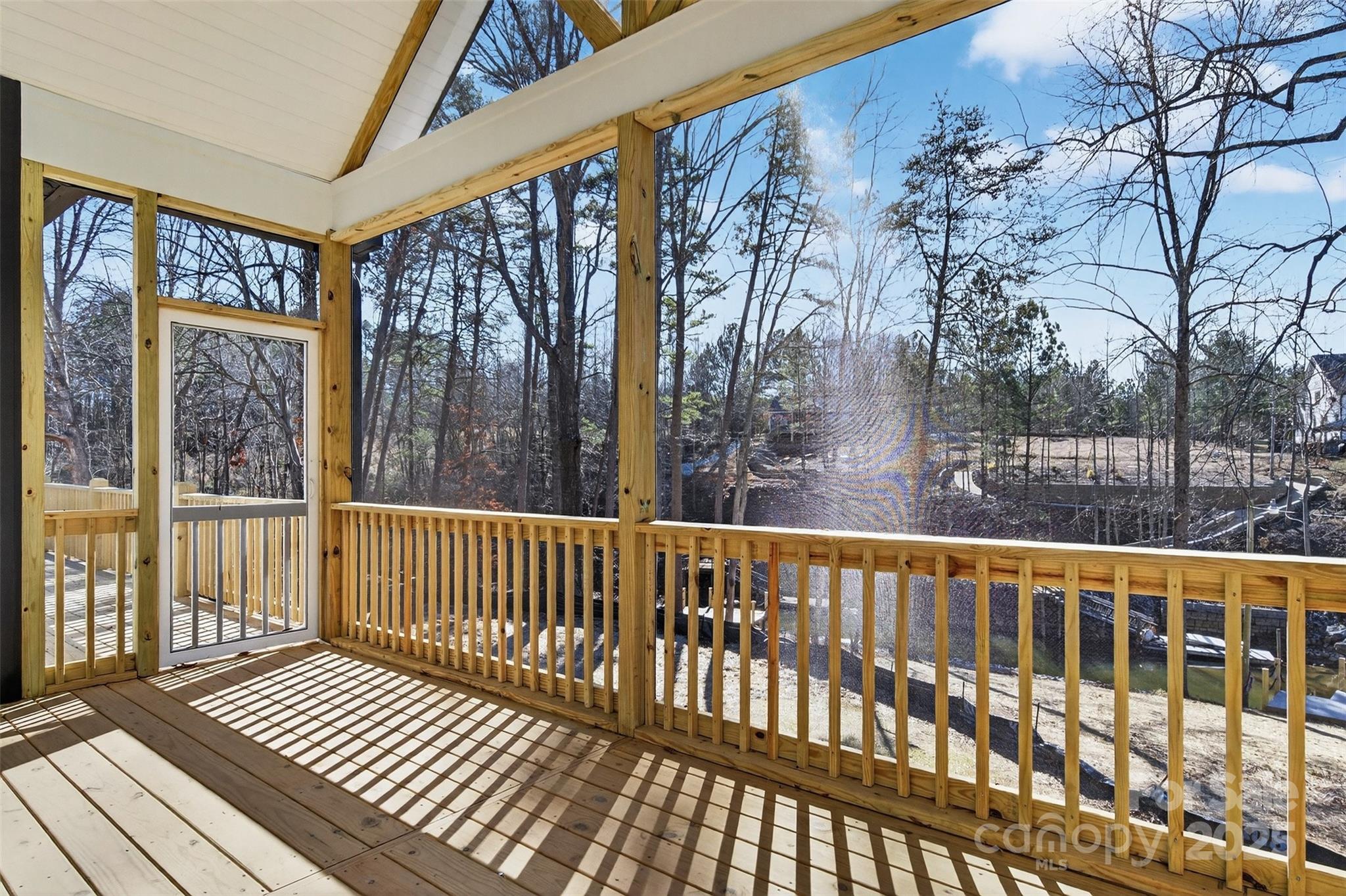7663 Keistlers Store Road Sherrills Ford, NC 28673 - Photo 35 of 45 a view of a porch with wooden floor and outdoor space