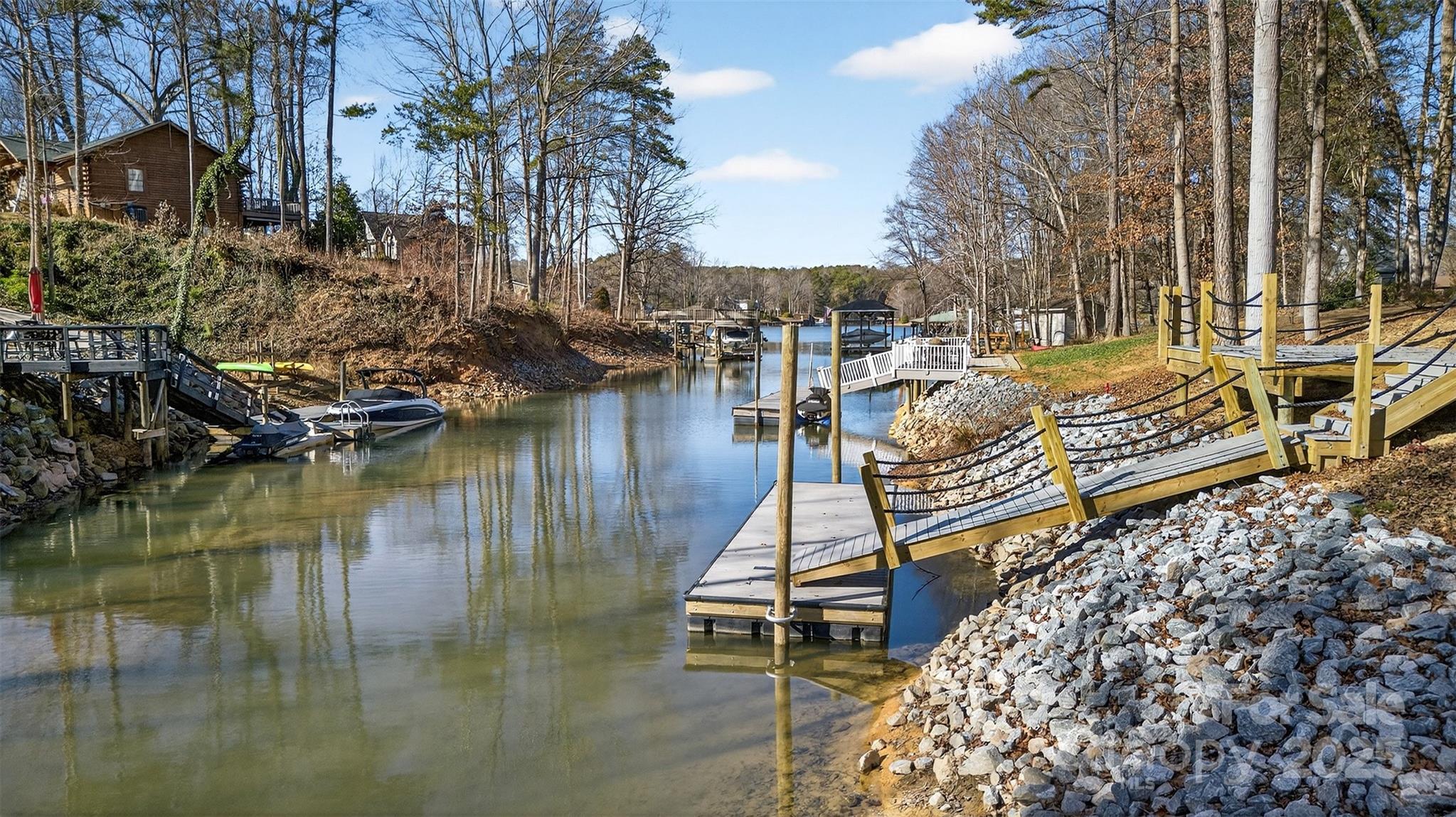 7663 Keistlers Store Road Sherrills Ford, NC 28673 - Photo 45 of 45 a lake view with boat and palm trees