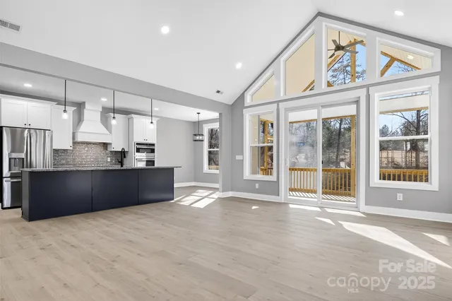 a view of kitchen with windows
