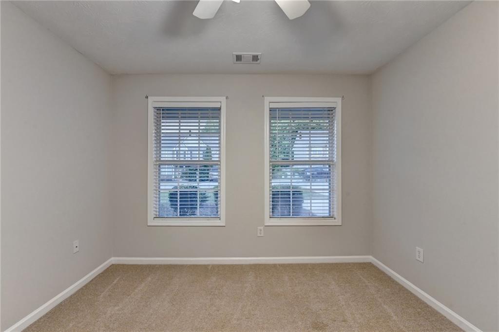 310 Andrew Ridge Drive Jefferson, GA 30549 - Photo 46 of 52 an empty room with windows