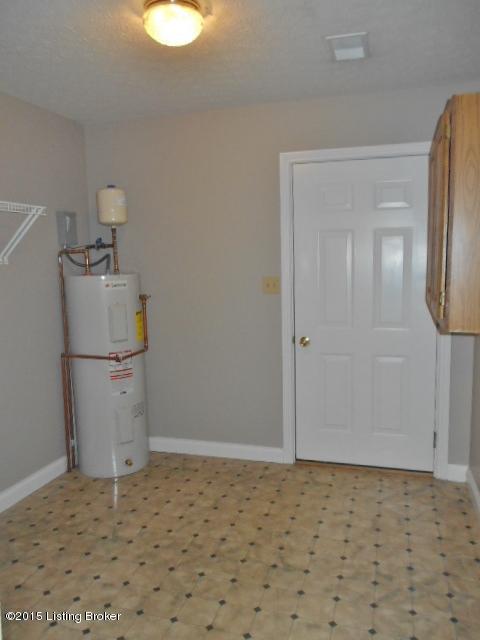 1121 Foxfire Road Bardstown, KY 40004 - Photo 14 of 19 Large utility room just off the kitchen with access to attached garage