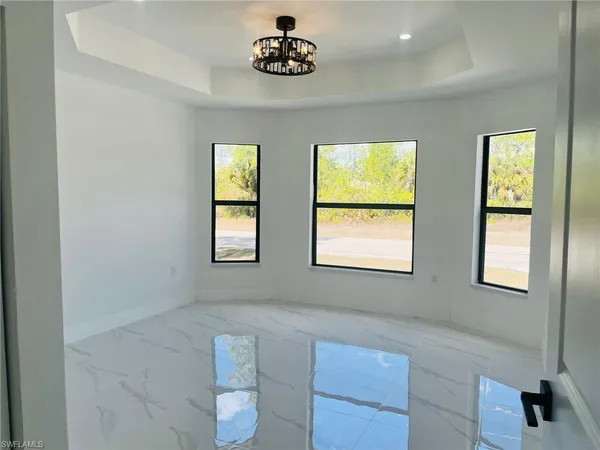 a bathroom with a bathtub and window