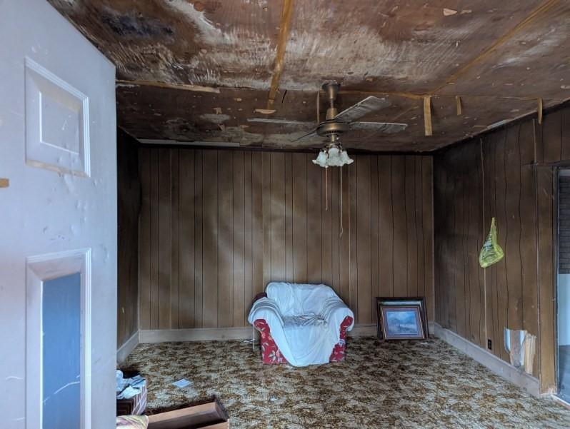 1172 Midway Road Northwest Resaca, GA 30735 - Photo 14 of 25 a room with water heater and wooden walls