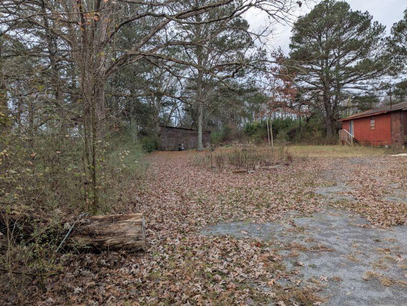 1172 Midway Road Northwest Resaca, GA 30735 - Photo 22 of 25 a backyard of a house with lots of green space