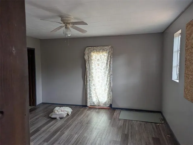 a kitchen with a sink and a refrigerator