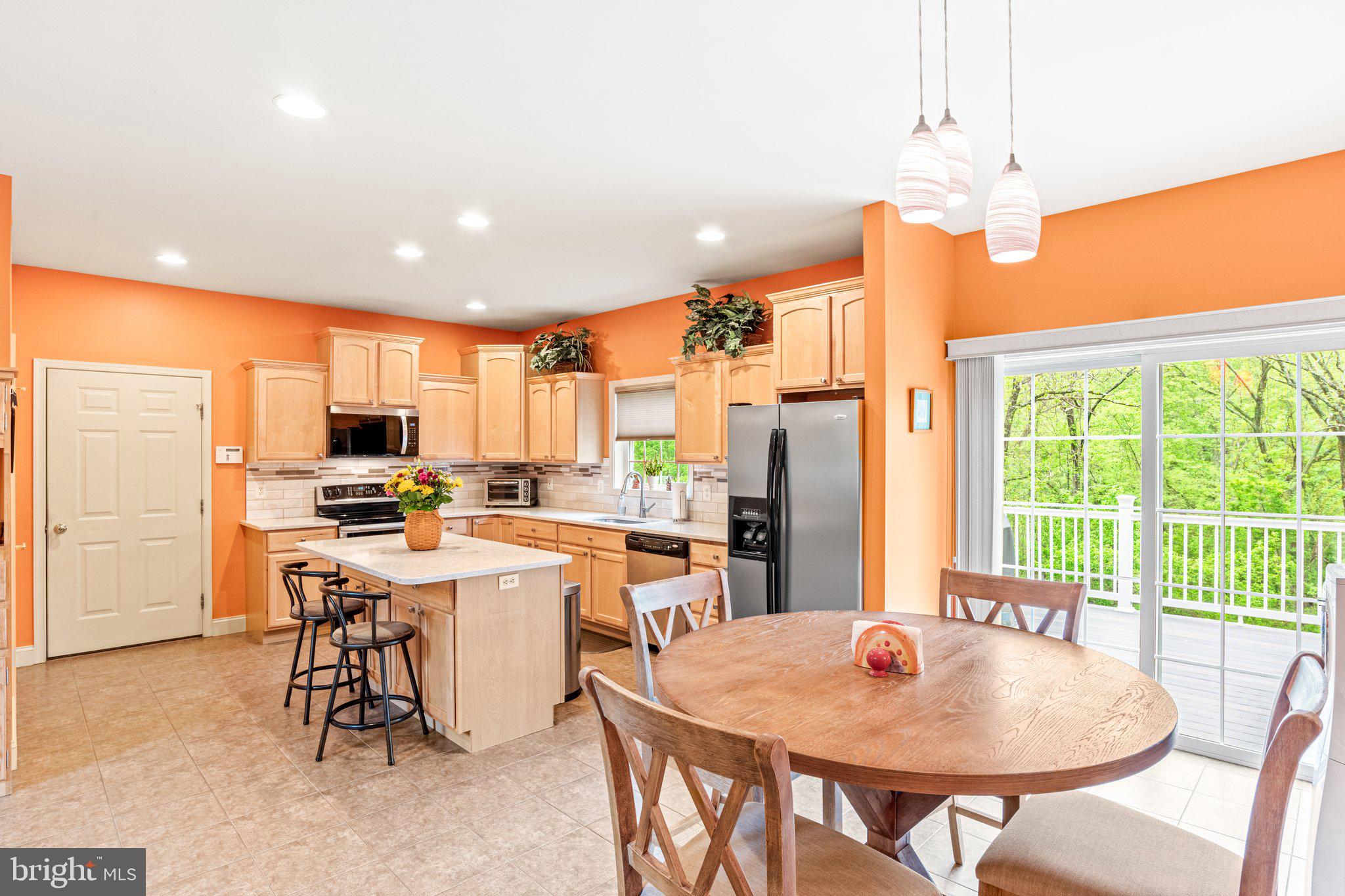 159 Dividing Ridge Road Halifax, PA 17032 - Photo 16 of 57 a large kitchen with a table and chairs