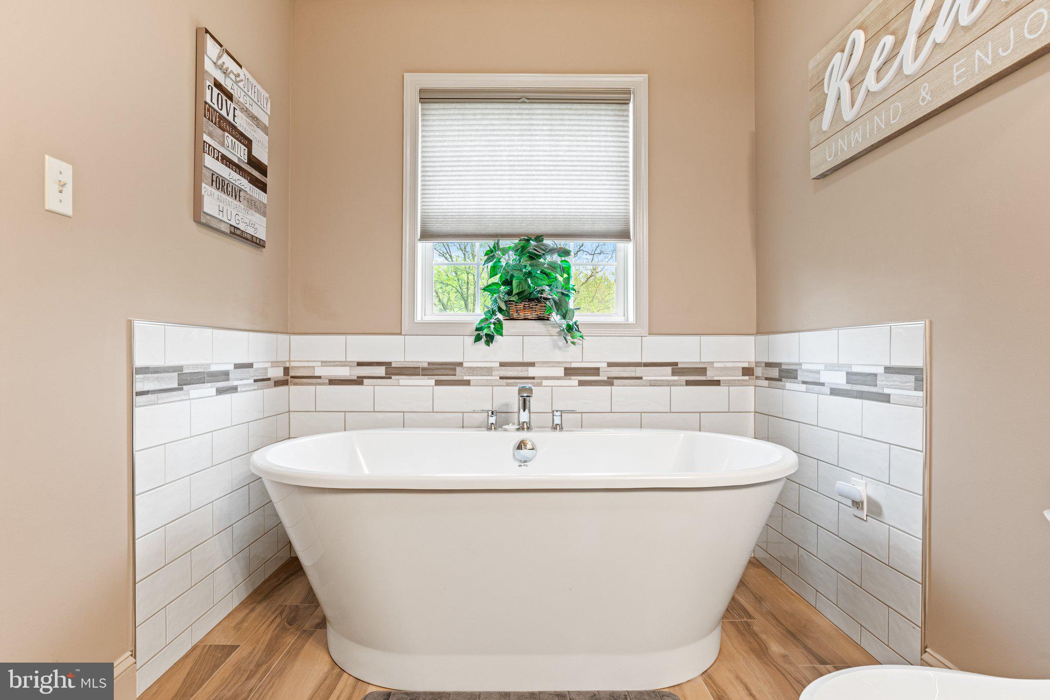 159 Dividing Ridge Road Halifax, PA 17032 - Photo 26 of 57 a white bath tub sitting in a bathroom