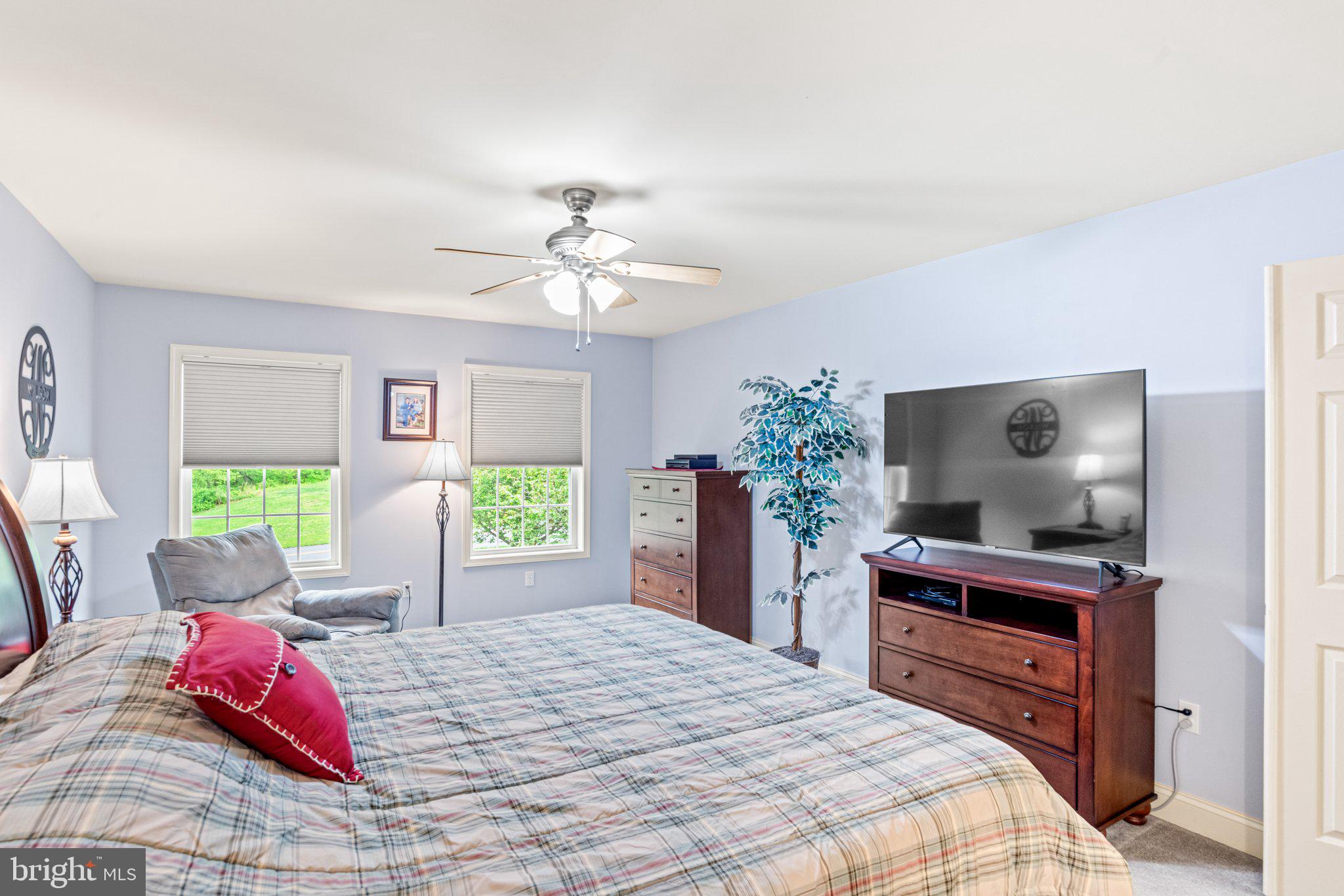 159 Dividing Ridge Road Halifax, PA 17032 - Photo 28 of 57 a bedroom with a bed and a flat screen tv
