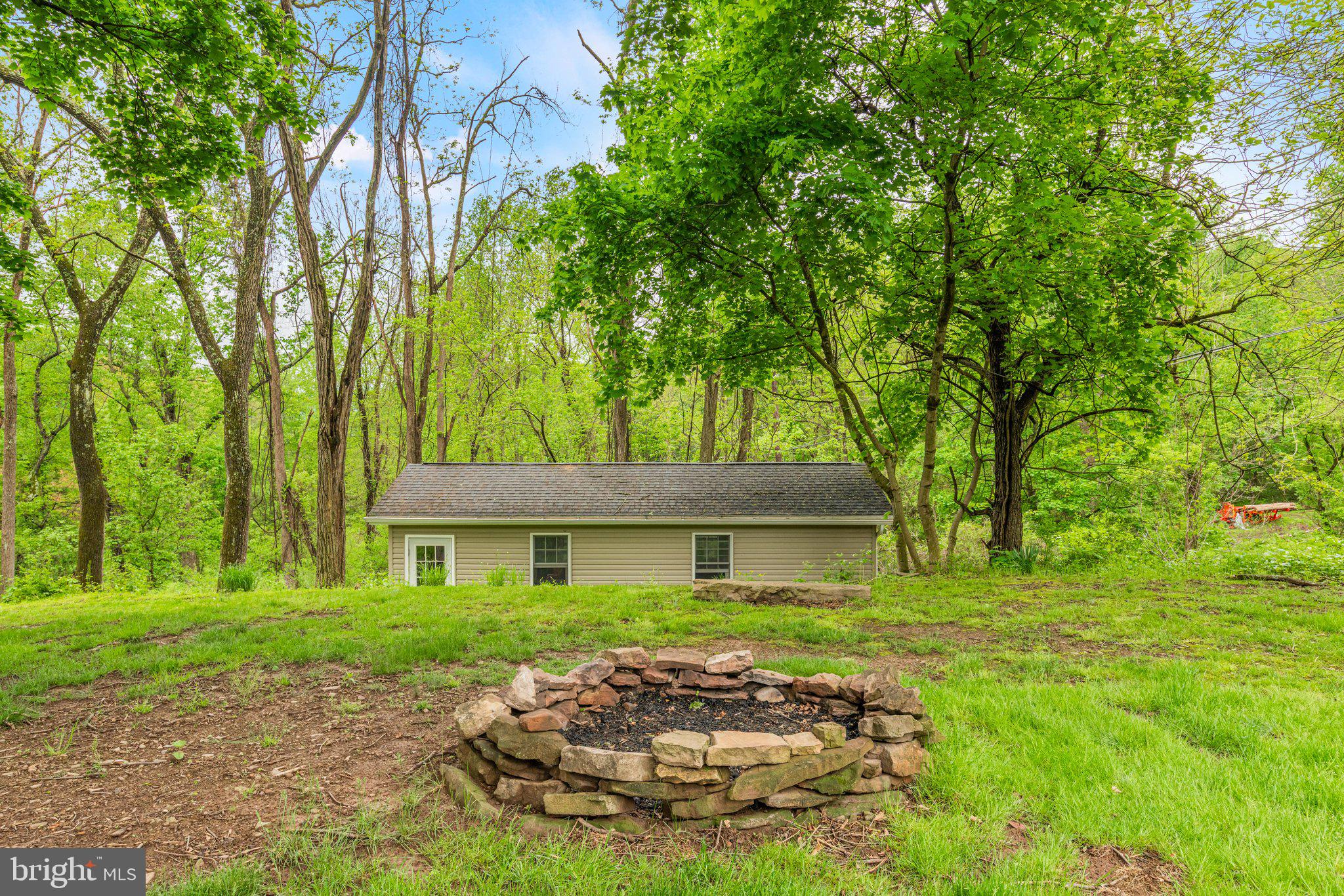 159 Dividing Ridge Road Halifax, PA 17032 - Photo 48 of 57 a front view of a house with garden