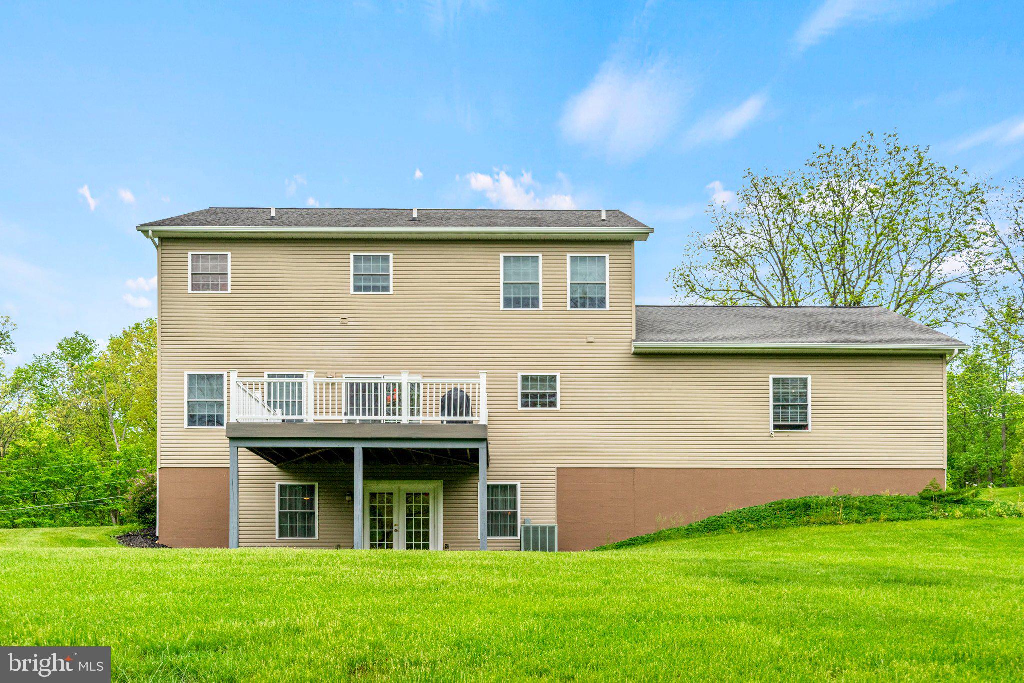 159 Dividing Ridge Road Halifax, PA 17032 - Photo 53 of 57 a front view of a house with a garden and yard