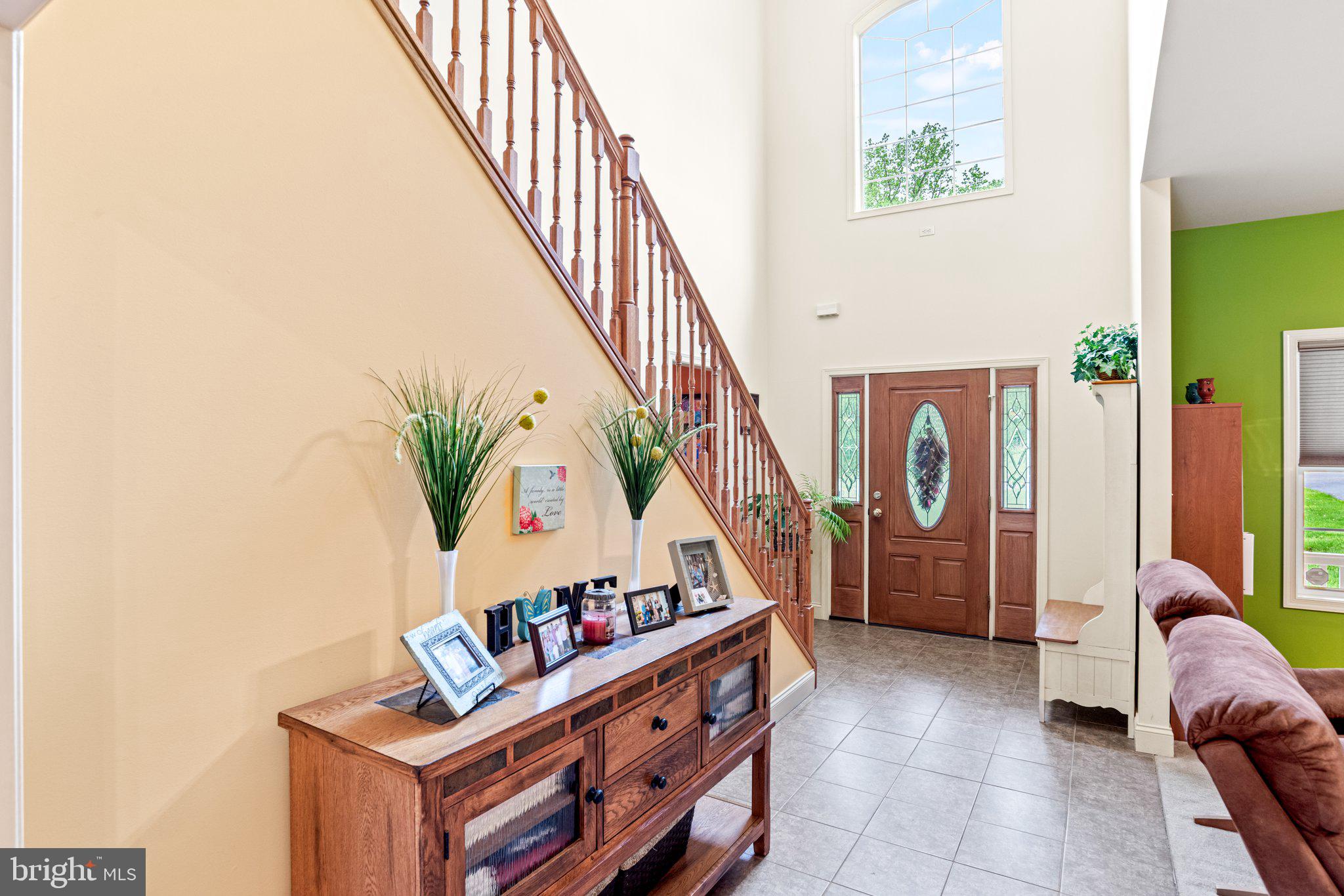 159 Dividing Ridge Road Halifax, PA 17032 - Photo 7 of 57 a living room with furniture and a potted plant