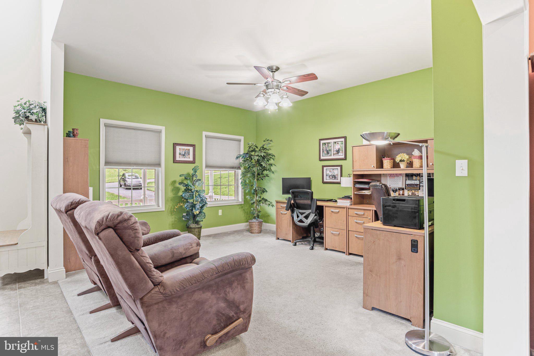 159 Dividing Ridge Road Halifax, PA 17032 - Photo 8 of 57 a living room with furniture and a flat screen tv