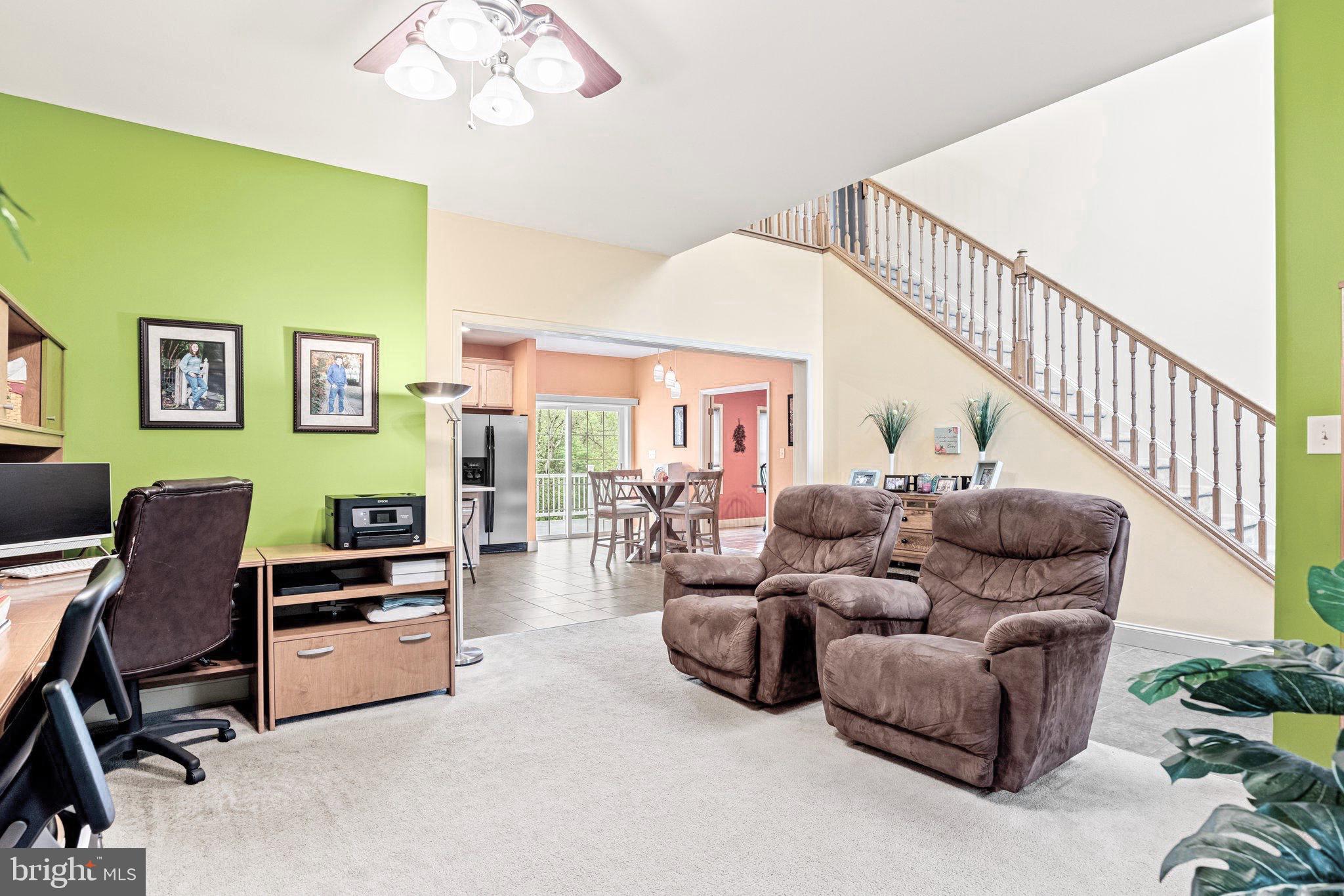 159 Dividing Ridge Road Halifax, PA 17032 - Photo 9 of 57 a living room with furniture and a potted plant