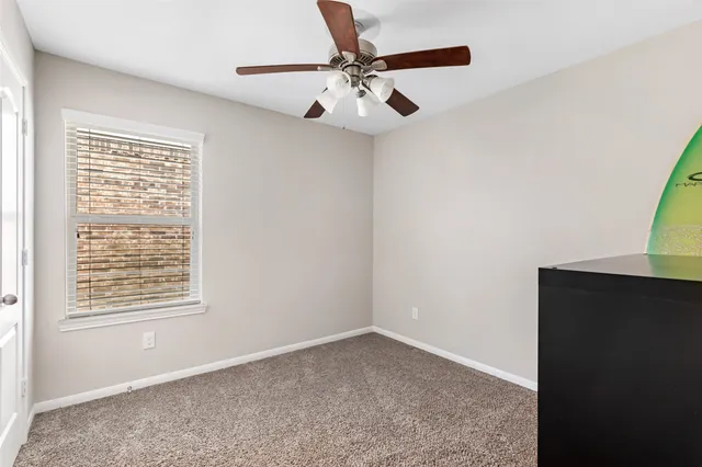 a garden with wooden fence