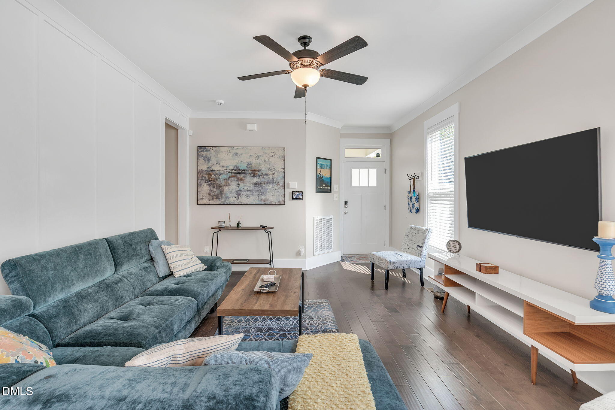510 Eugene Street Durham, NC 27701 - Photo 11 of 42 a living room with furniture and a flat screen tv
