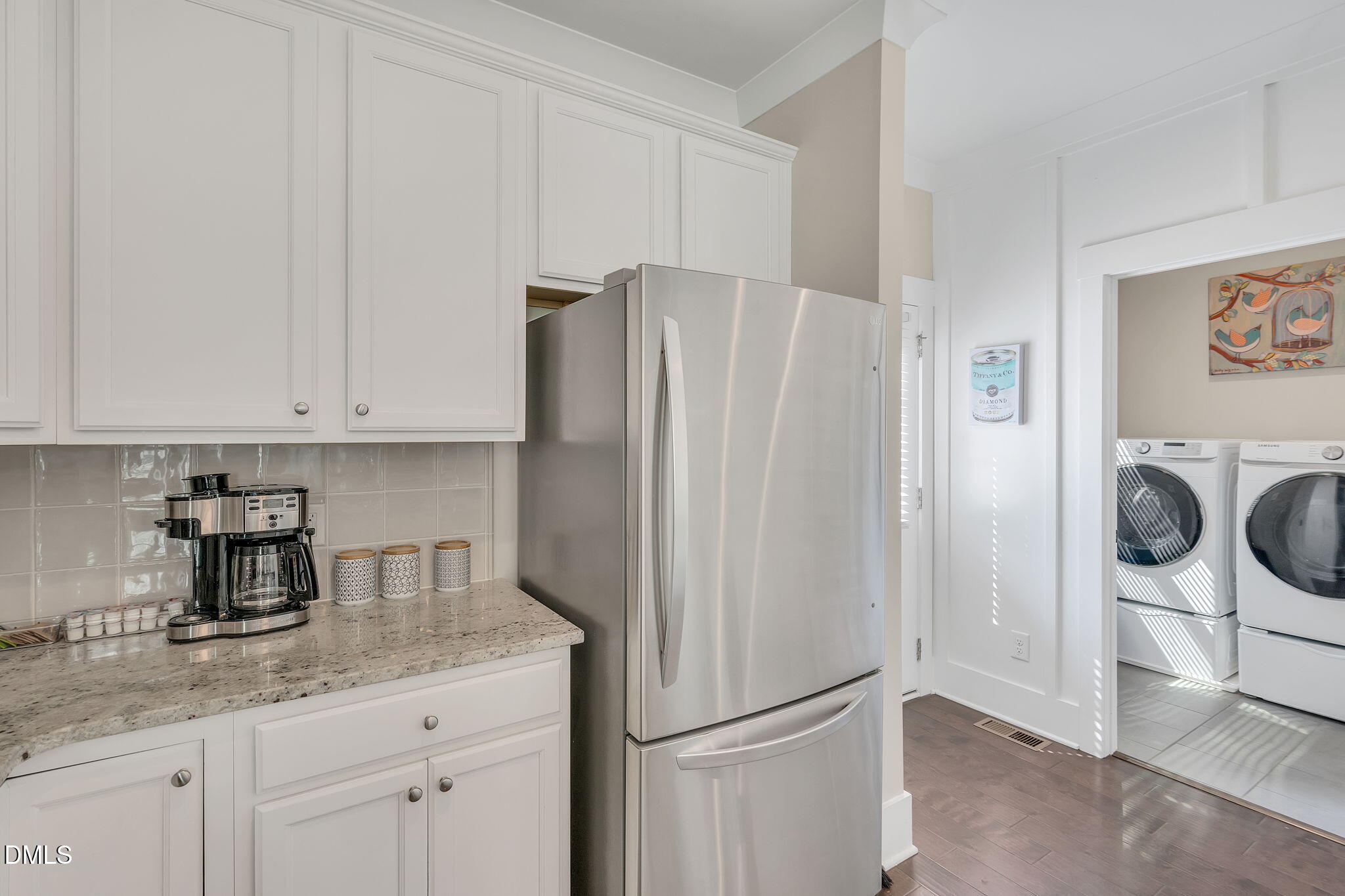 510 Eugene Street Durham, NC 27701 - Photo 17 of 42 a kitchen with stainless steel appliances granite countertop a refrigerator and a stove top oven