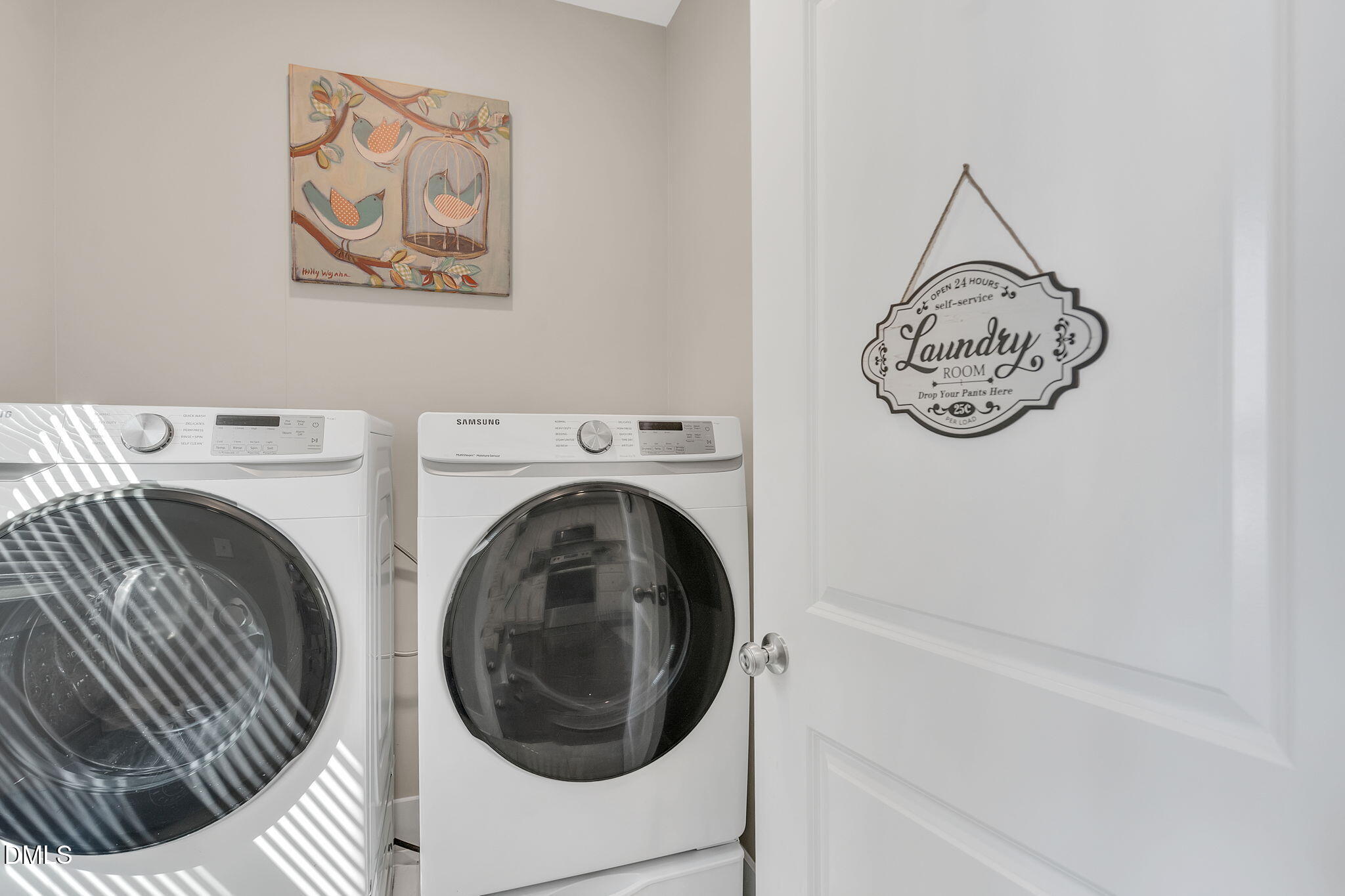 510 Eugene Street Durham, NC 27701 - Photo 18 of 42 a view of a hallway with washer and dryer