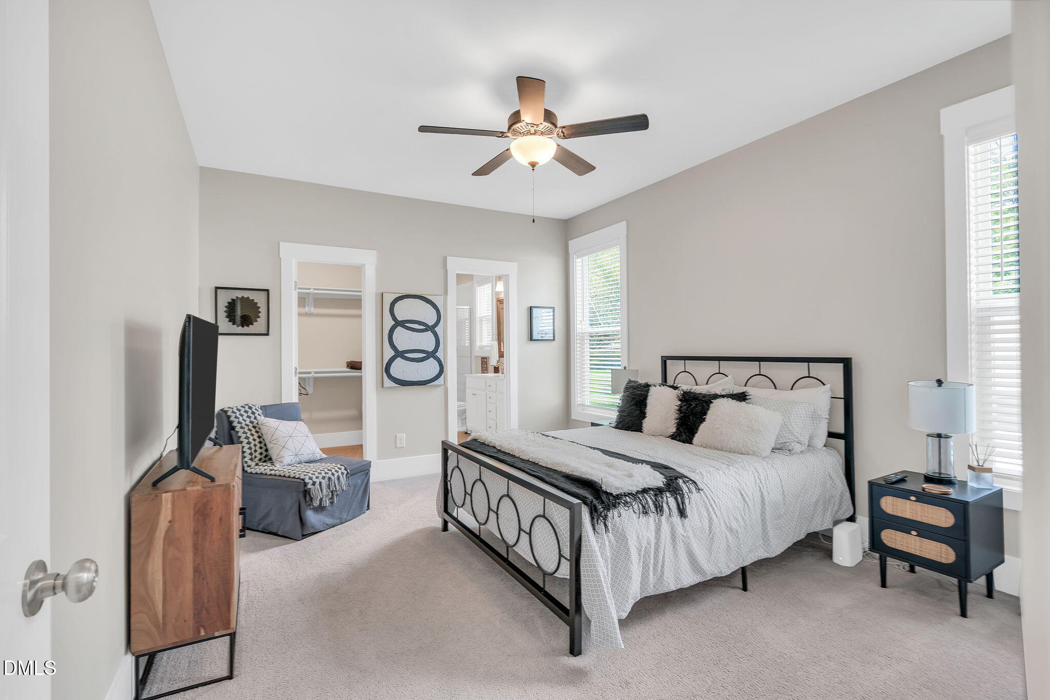 510 Eugene Street Durham, NC 27701 - Photo 19 of 42 a bedroom with bed and a chandelier