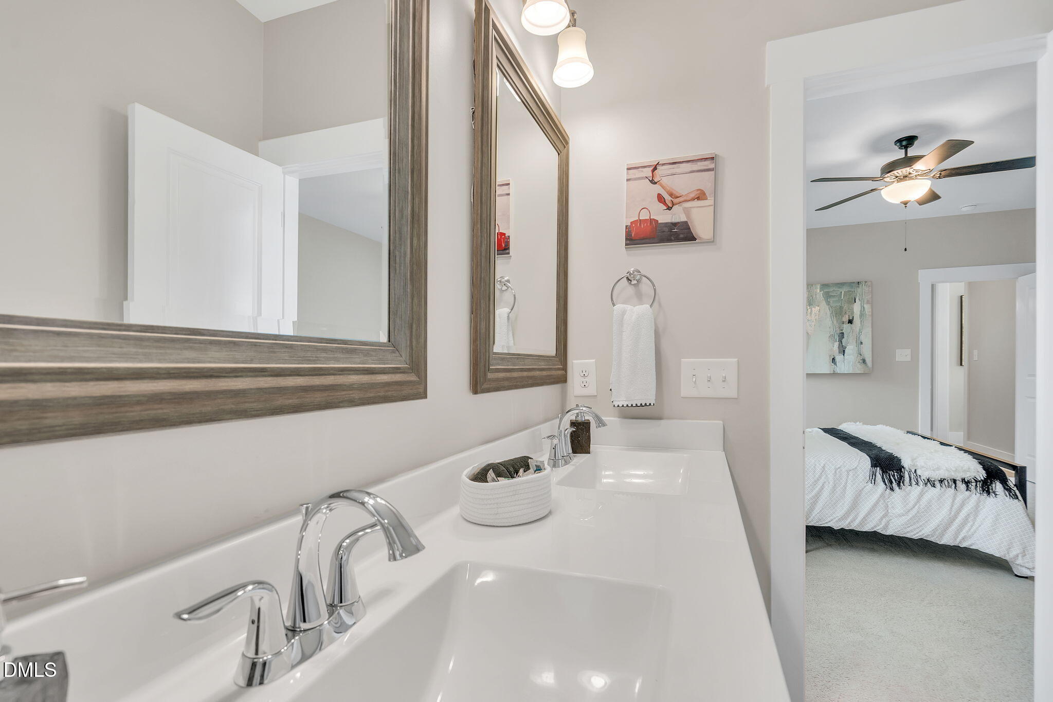 510 Eugene Street Durham, NC 27701 - Photo 25 of 42 a en suite bathroom with a double vanity sink and a mirror