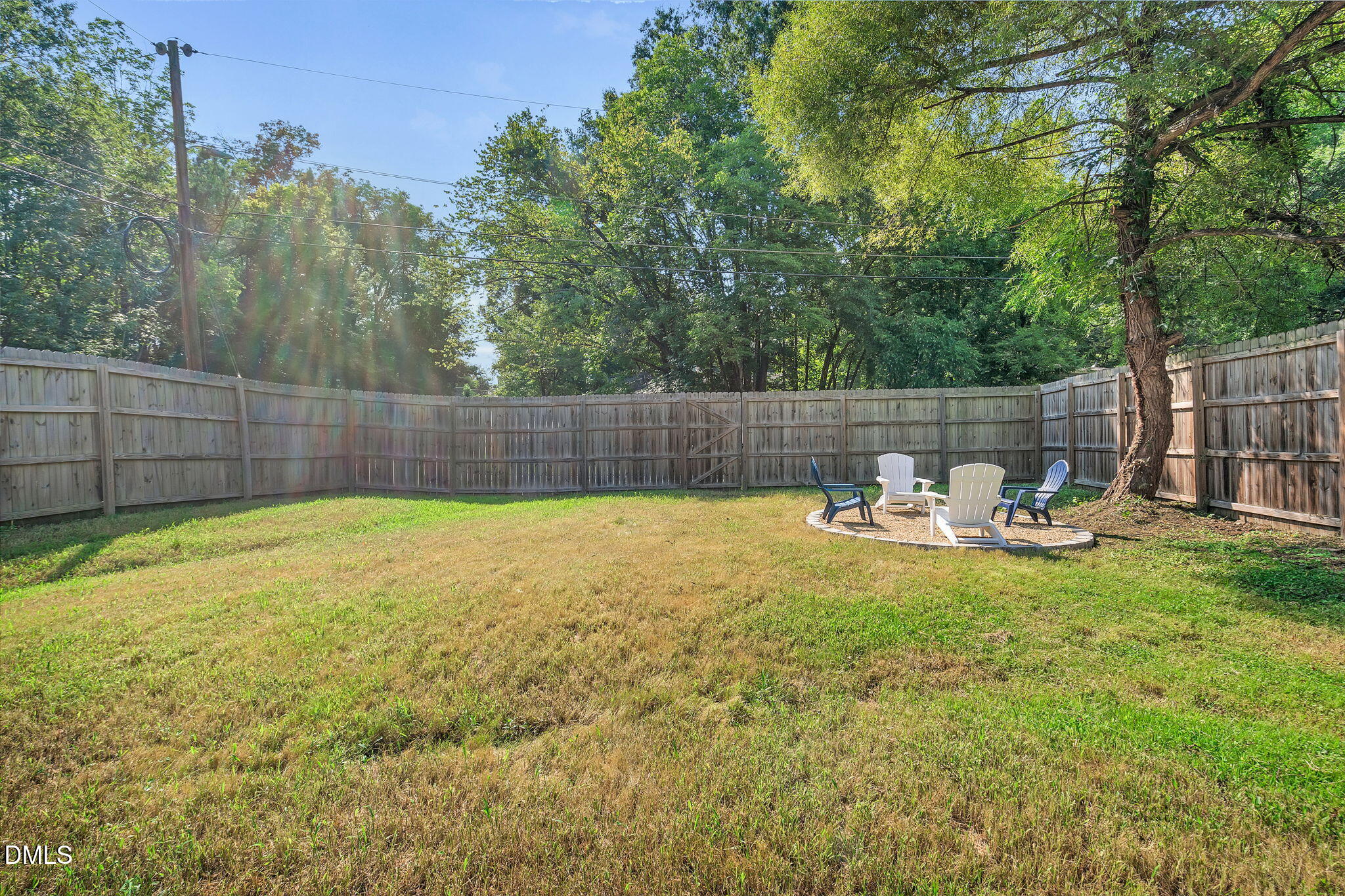 510 Eugene Street Durham, NC 27701 - Photo 38 of 42 a view of a backyard with a small swimming pool and sitting area