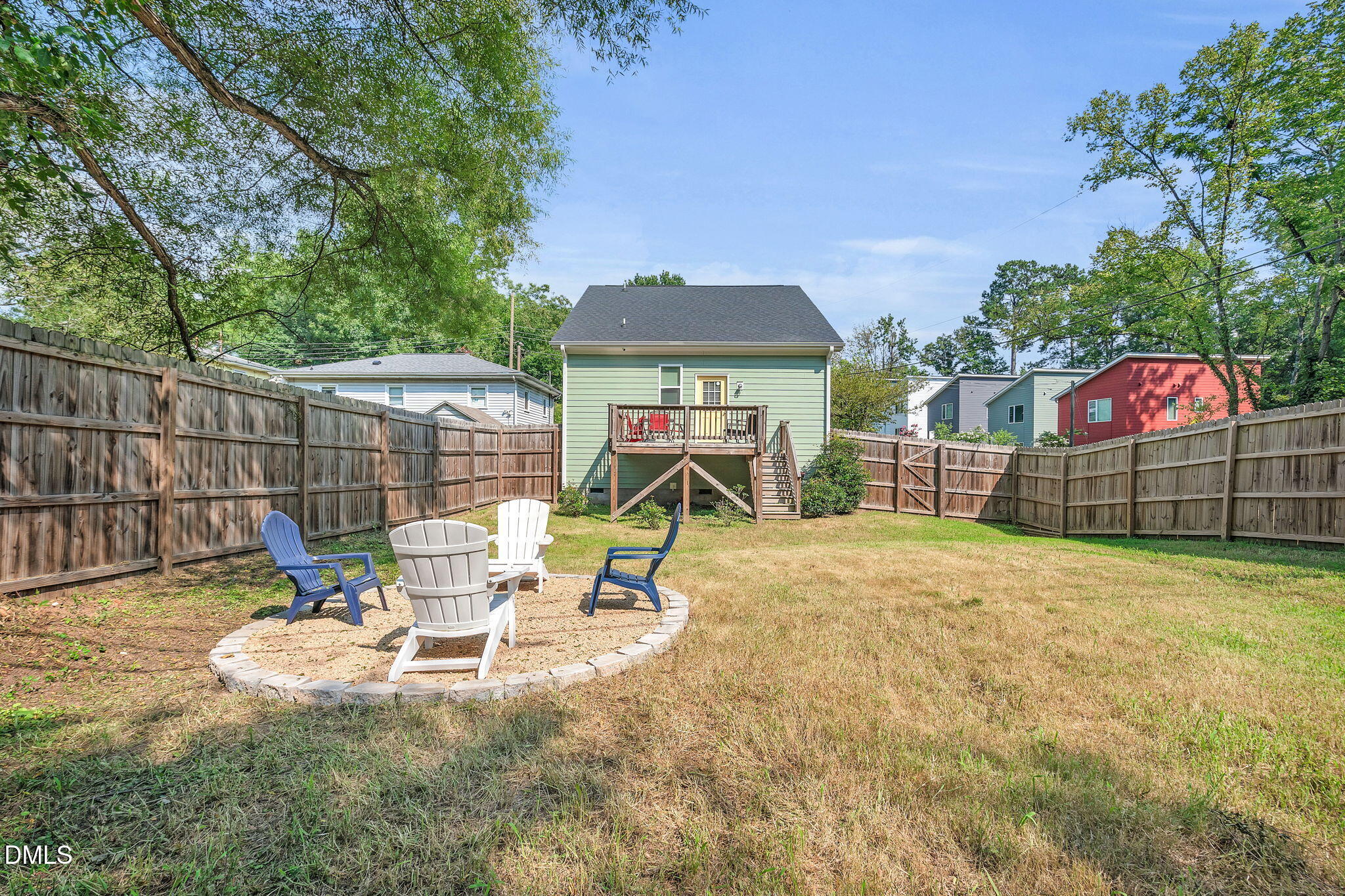510 Eugene Street Durham, NC 27701 - Photo 39 of 42 a view of a backyard with a patio and a garden