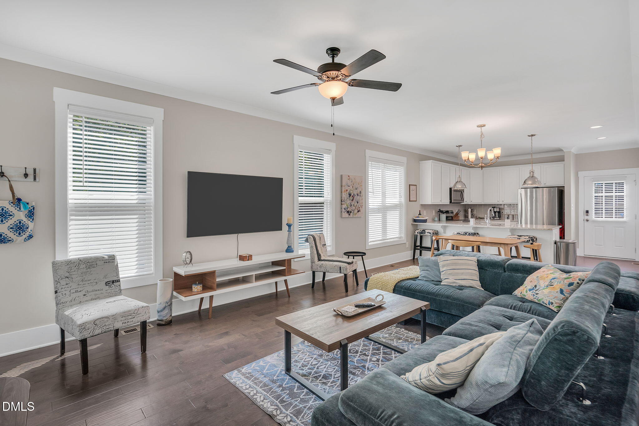 510 Eugene Street Durham, NC 27701 - Photo 7 of 42 a living room with furniture and a flat screen tv